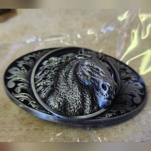 Silver horse belt buckle